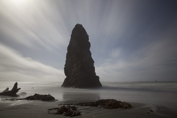Photo of a Large Stalagmite Rising From the Ocean