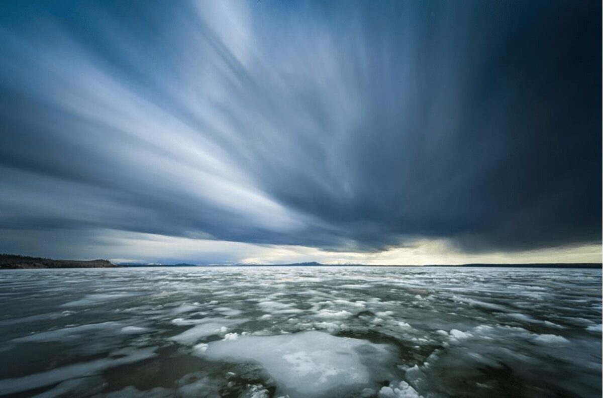 Frozen lake with dramatic clouds.